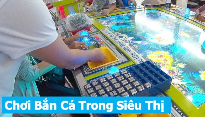 Playing fish shooting game for coins in supermarkets